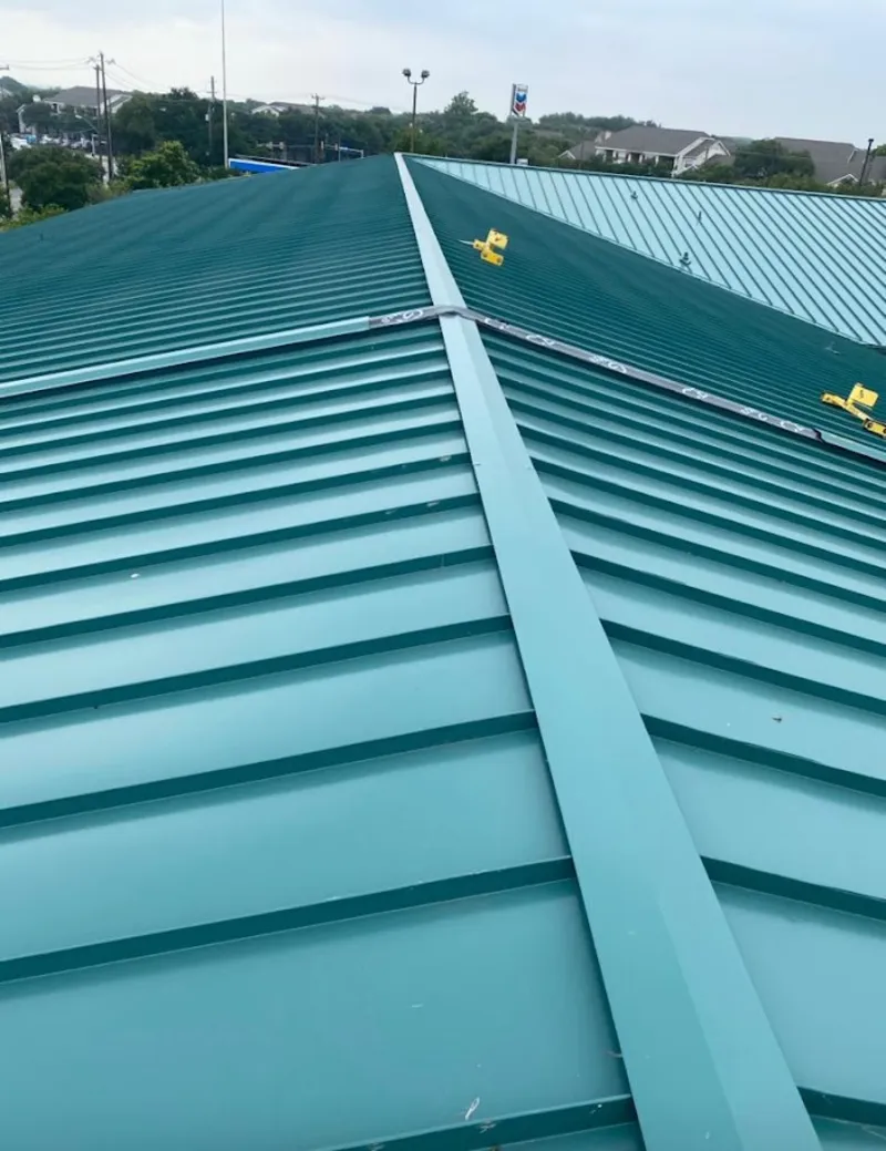 Green commercial metal roof ridge and valley for Metal Roof Repair in La Grange