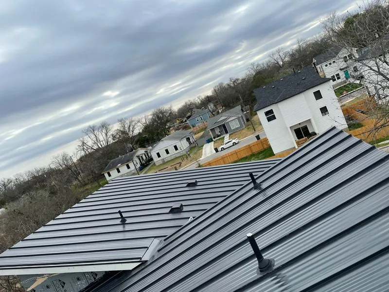 Standing seam metal roof panels with vents for Skylight Repair in La Grange